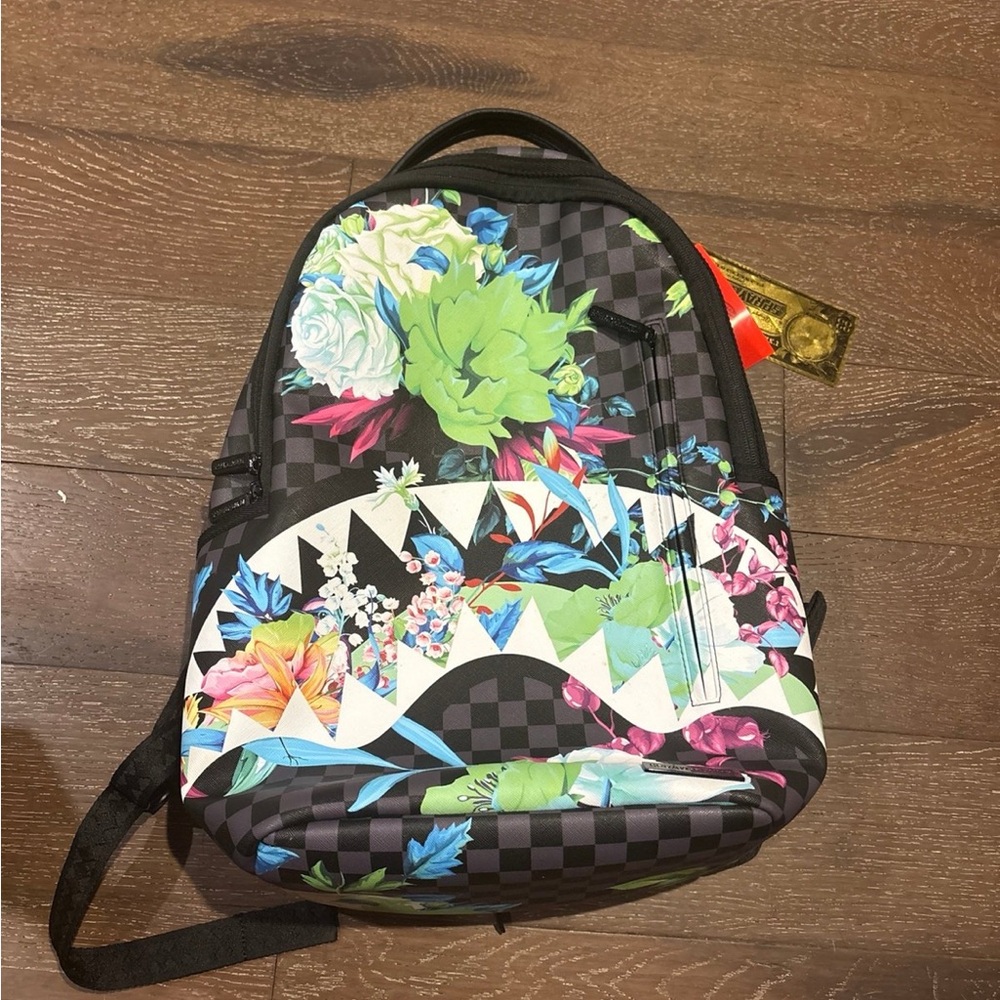 Spraygrounds floral shark backpack.